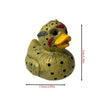 A yellow speckled duck figurine with red accents, used for Halloween decor.