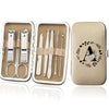 An open leather case displaying an 8-piece stainless steel manicure and pedicure kit with various tools.