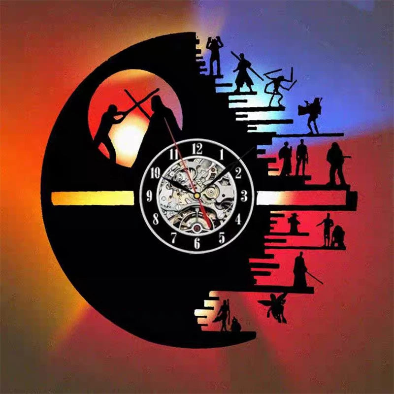 A circular light display featuring silhouettes of people standing on steps around a clock face.