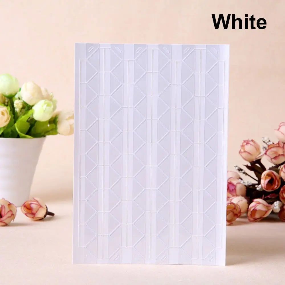 A white PVC photo corner protector with a diamond lattice pattern is shown next to some light pink roses.