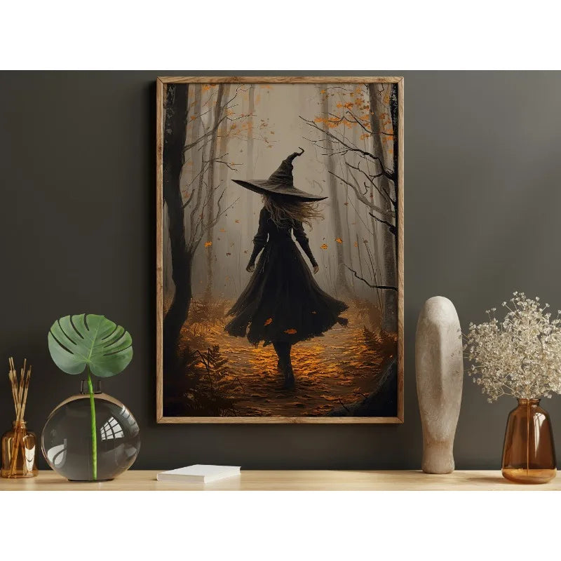 Canvas wall art depicting a dark witch in a wide-brimmed hat standing in an autumnal forest setting.