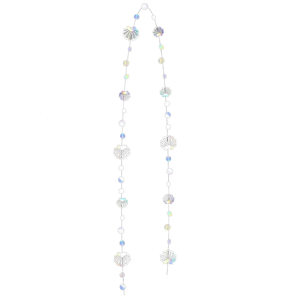 Iridescent mermaid and jellyfish party streamers featuring various translucent, shimmering shapes.
