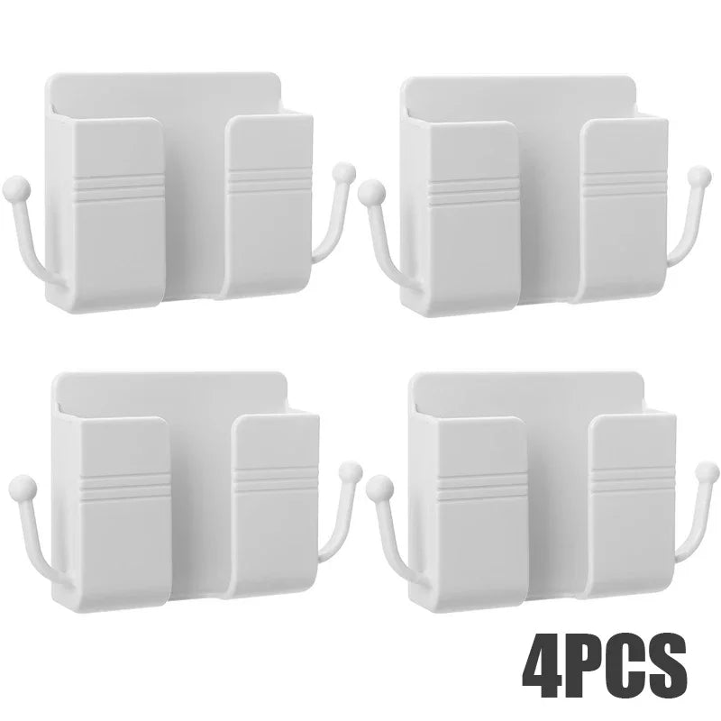 Four white wall-mounted multifunctional organizers with phone holders and charging docks