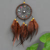 Handmade boho feather dream catcher wall decor featuring brown feathers and a circular woven hoop