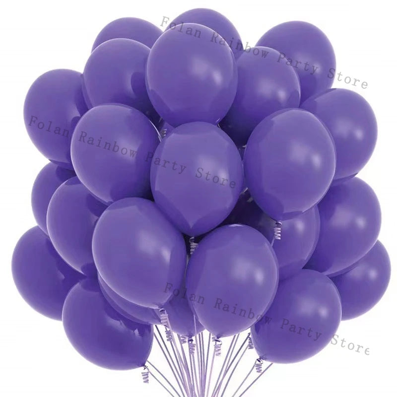 A bunch of matte purple latex balloons tied together, ready for a party decoration.