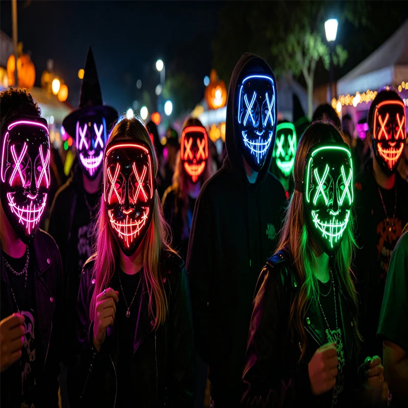 Group of people wearing glow-in-the-dark LED purge masks for Halloween cosplay at a night event
