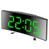 A black LED mirror alarm clock with a large green digital display and control buttons.