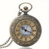 Vintage bronze quartz pocket watch with a chain and ornate engraving on the face