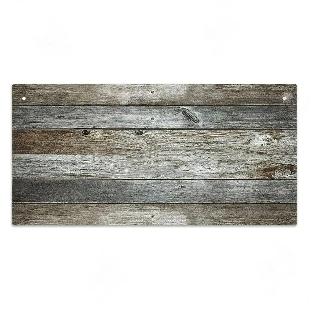A rustic wooden sign made of weathered gray and brown planks for home decor.