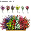 A collection of 12 artificial lavender stems in various colors and shades displayed in a wooden basket.