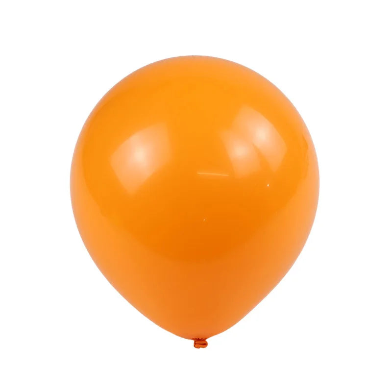 A single, round, glossy orange latex balloon.