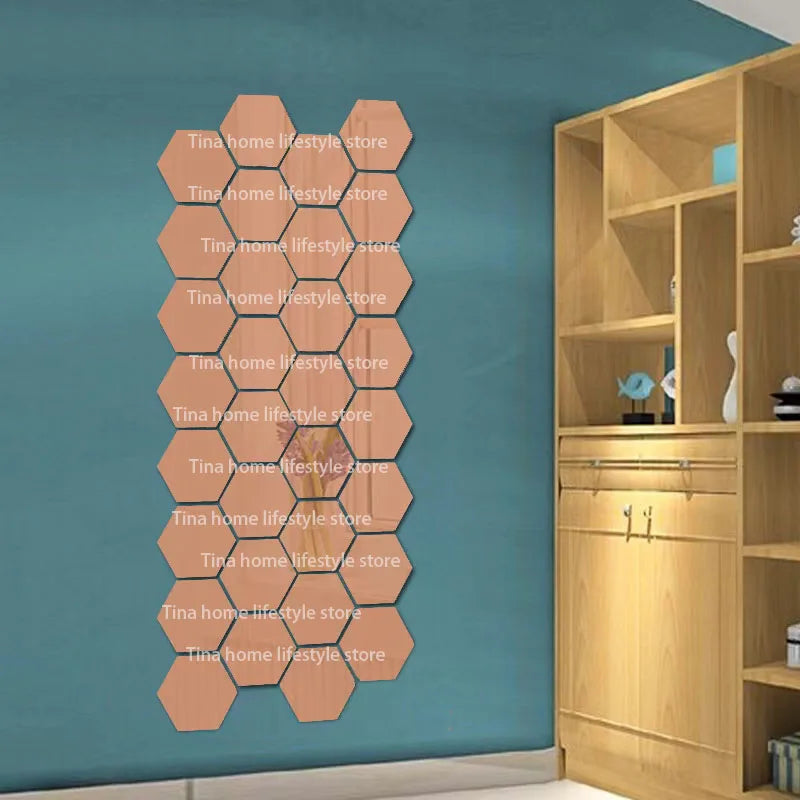 A vertical display of 12 self-adhesive hexagon mirror wall decor stickers in a light wood tone against a teal wall.