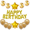 A set of gold and white foil letter balloons and a star balloon for a birthday party decoration