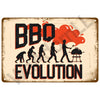 A distressed metal sign with the text BBQ EVOLUTION featuring silhouettes of people cooking and a red flame background.