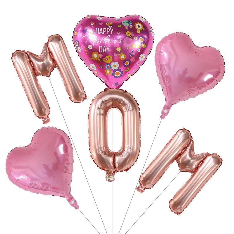A set of six pink foil balloons shaped like hearts and the number zero for Mother's Day decoration