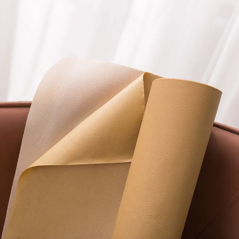 Rolls of self-adhesive PU leather furniture repair patches in beige and tan colors