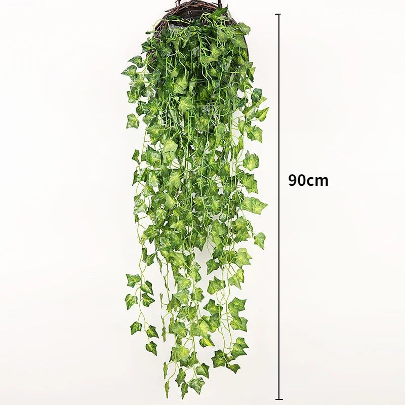 A long, cascading garland of artificial green ivy vine with a 90cm length for indoor and outdoor decoration.