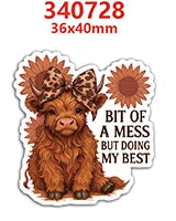A brown lamb charm with a floral pattern and a sunflower design.