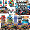 Monster truck birthday party decoration kit featuring a backdrop, tableware, and toy trucks.