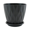 A set of six round, dark gray plastic plant pots with drainage saucers.