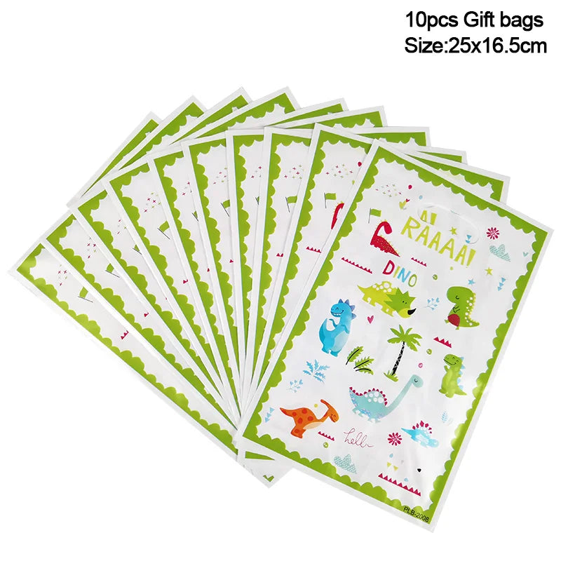 A stack of 10 green and white disposable gift bags for a dinosaur party.