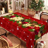 A red plaid tablecloth featuring green holly and gold poinsettia designs.