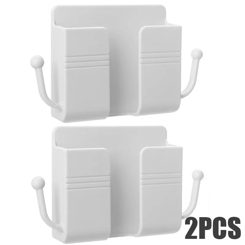 A pair of white wall-mounted multifunctional organizers with phone holders and charging docks.