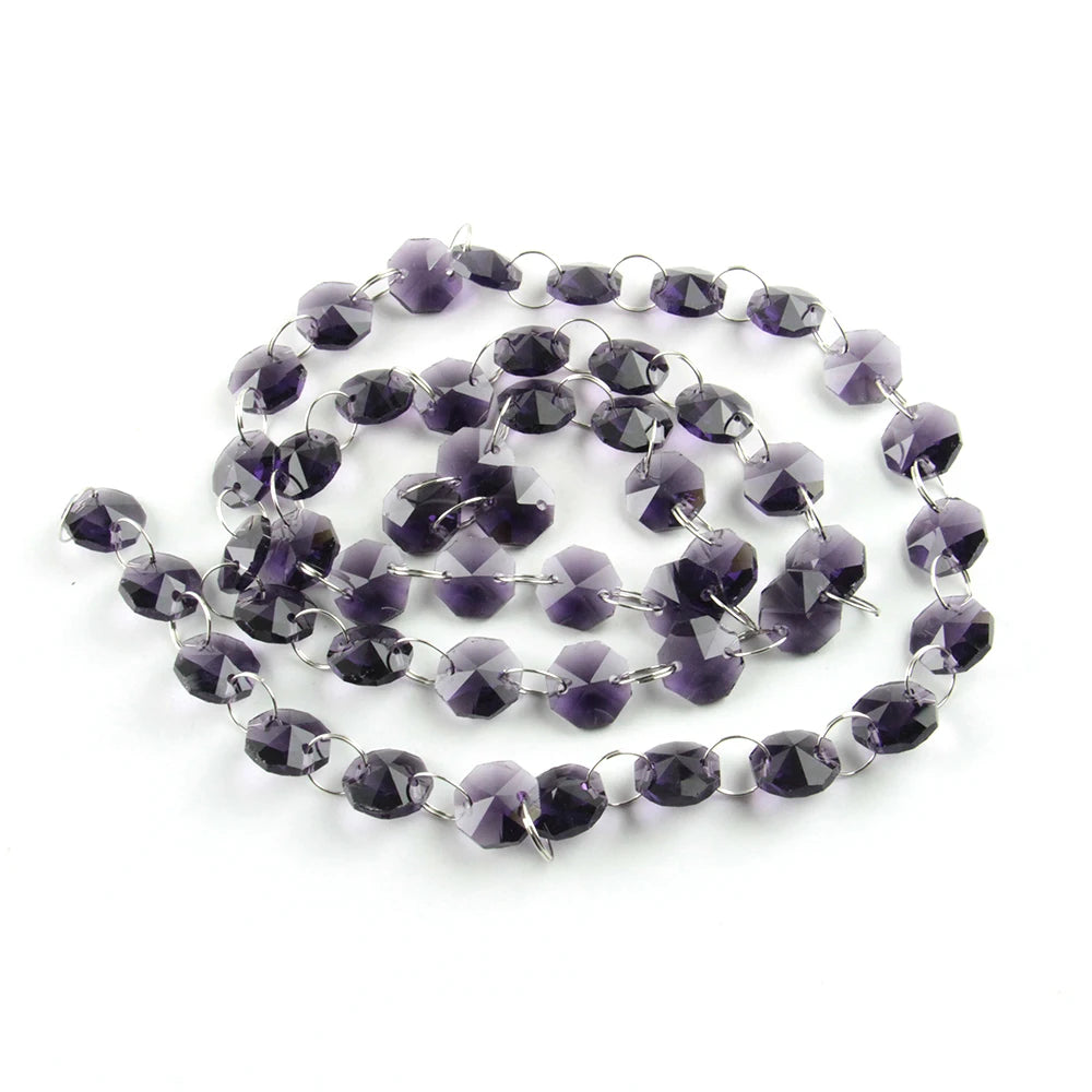 A strand of purple crystal glass octagon beads used for home decor.