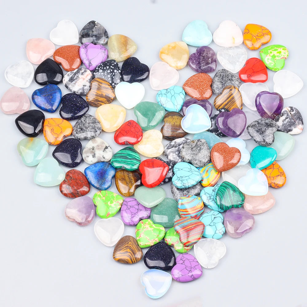 A heart shape composed of numerous small, polished amethyst and other colored crystal stones.