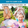 A child is filling a water balloon with an automatic filler, while another child is splashing water on their head.