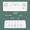 A white digital alarm clock with buttons for Alarm, Mode, Light Snooze, Up, and Down functions.