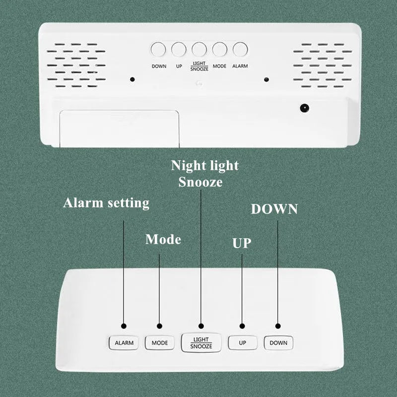 A white digital alarm clock with buttons for Alarm, Mode, Light Snooze, Up, and Down functions.