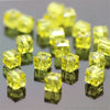 A collection of square cut yellow glass crystal beads for jewelry making