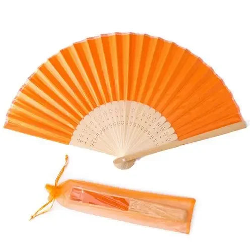 Orange silk wedding hand fans with bamboo frames shown in a fan shape and laid flat.