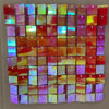 A grid of iridescent sequin shimmer wall panels in various shades of pink, orange, and purple.