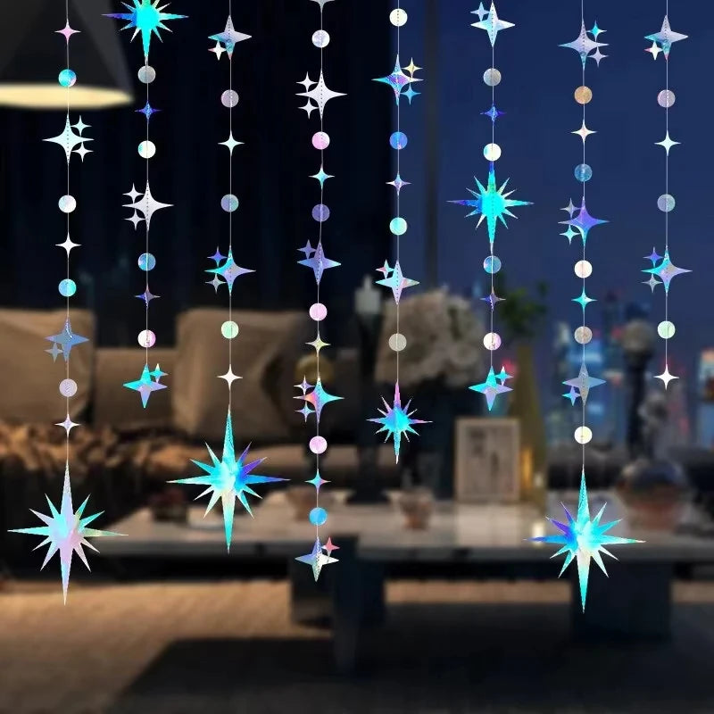 A vertical string of glittering star and polka dot lights hanging in the air.