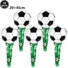 A pack of ten black and white soccer ball balloons with green stems for party decorations.