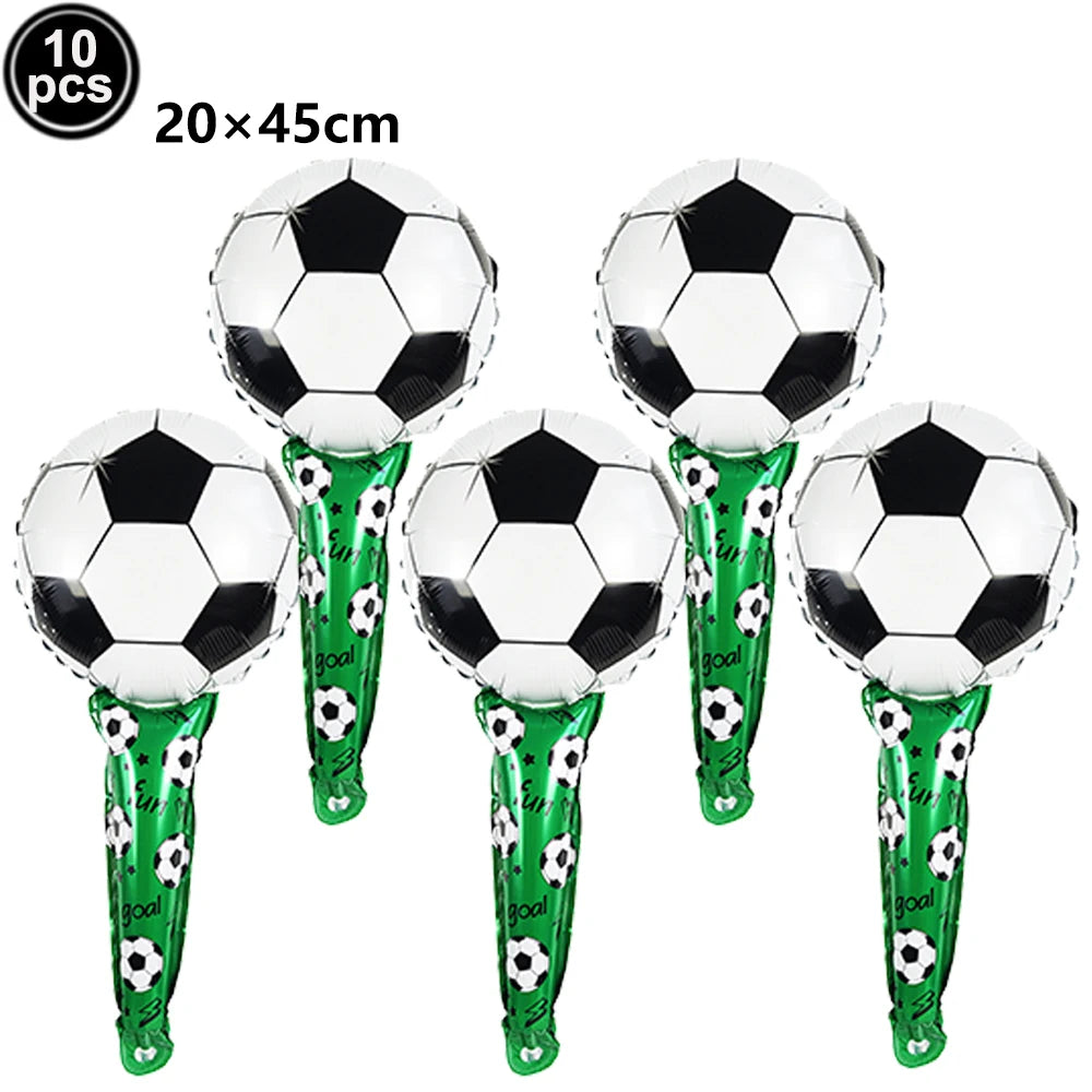 A pack of ten black and white soccer ball balloons with green stems for party decorations.