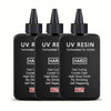 Five black dropper bottles of UV resin formulated for artists and jewelry making