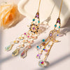 Gold crystal rhinestone sun and moon catchers hanging on a delicate chain