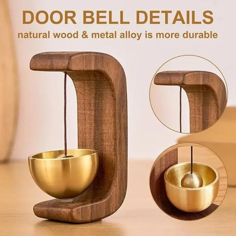 A wooden door bell featuring a brass bowl and hanging chime, highlighting durable natural wood and metal alloy.