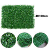 A rectangular panel of dense green artificial grass hedge material, shown with close-ups of the texture and foliage.