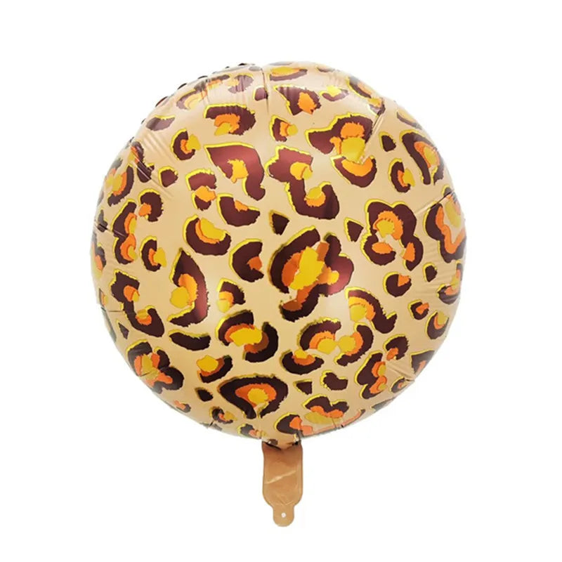 A round balloon with a leopard print pattern in shades of brown, yellow, and black.