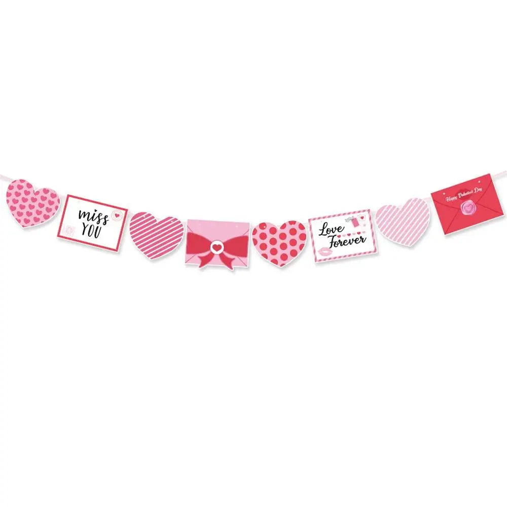 A string of red heart letter balloons with a foil finish spelling out I Love You Forever