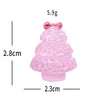 A small pink resin Christmas tree charm with a bow, measuring 5.9g and 2.8cm tall.