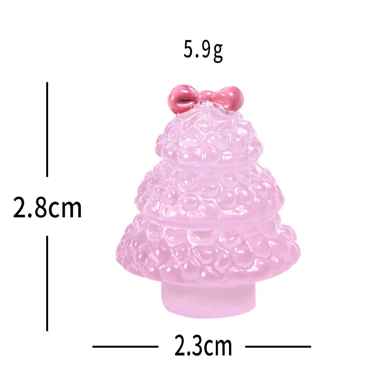 A small pink resin Christmas tree charm with a bow, measuring 5.9g and 2.8cm tall.
