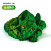 A vibrant green articulated figurine of a hairless cat with large eyes.