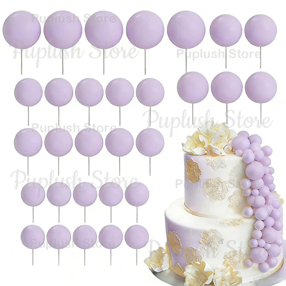 A set of purple foam cake toppers, including round and petal shapes, for decoration.