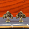 Brass fortune tree ornament with ingot accents displayed on a dark surface.