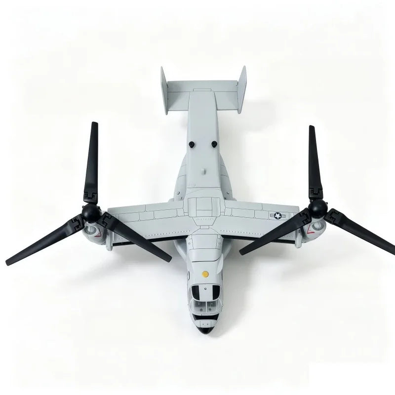 A gray V-22 Osprey tiltrotor model built from plastic building blocks.